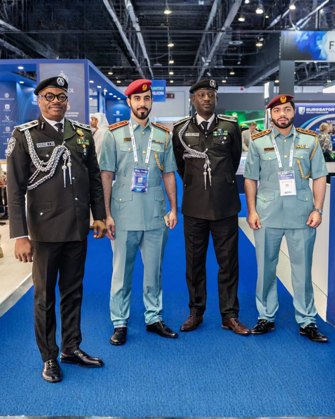 Officers from international forces together on the exhibition floor