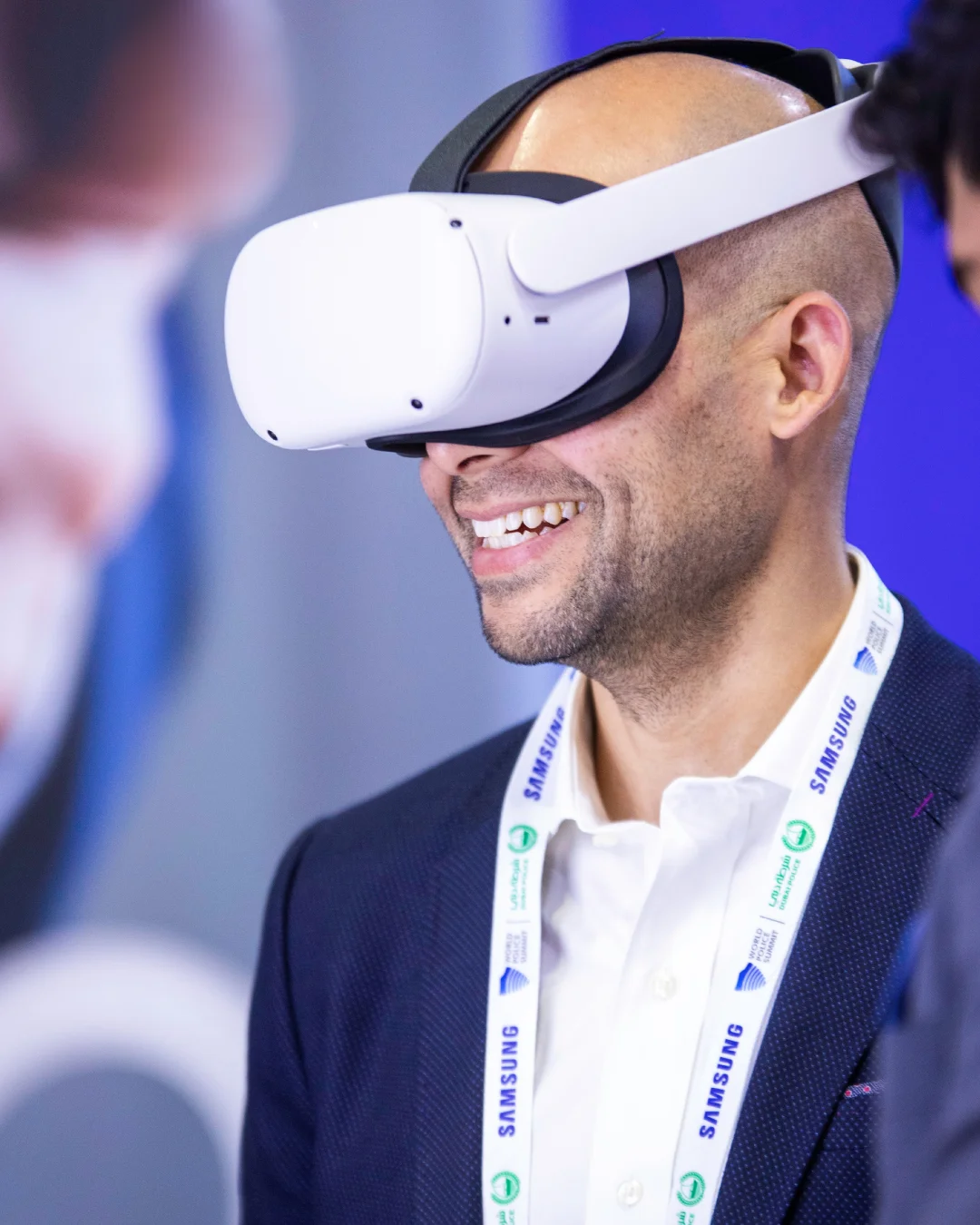Delegate trying a VR experience on the summit floor